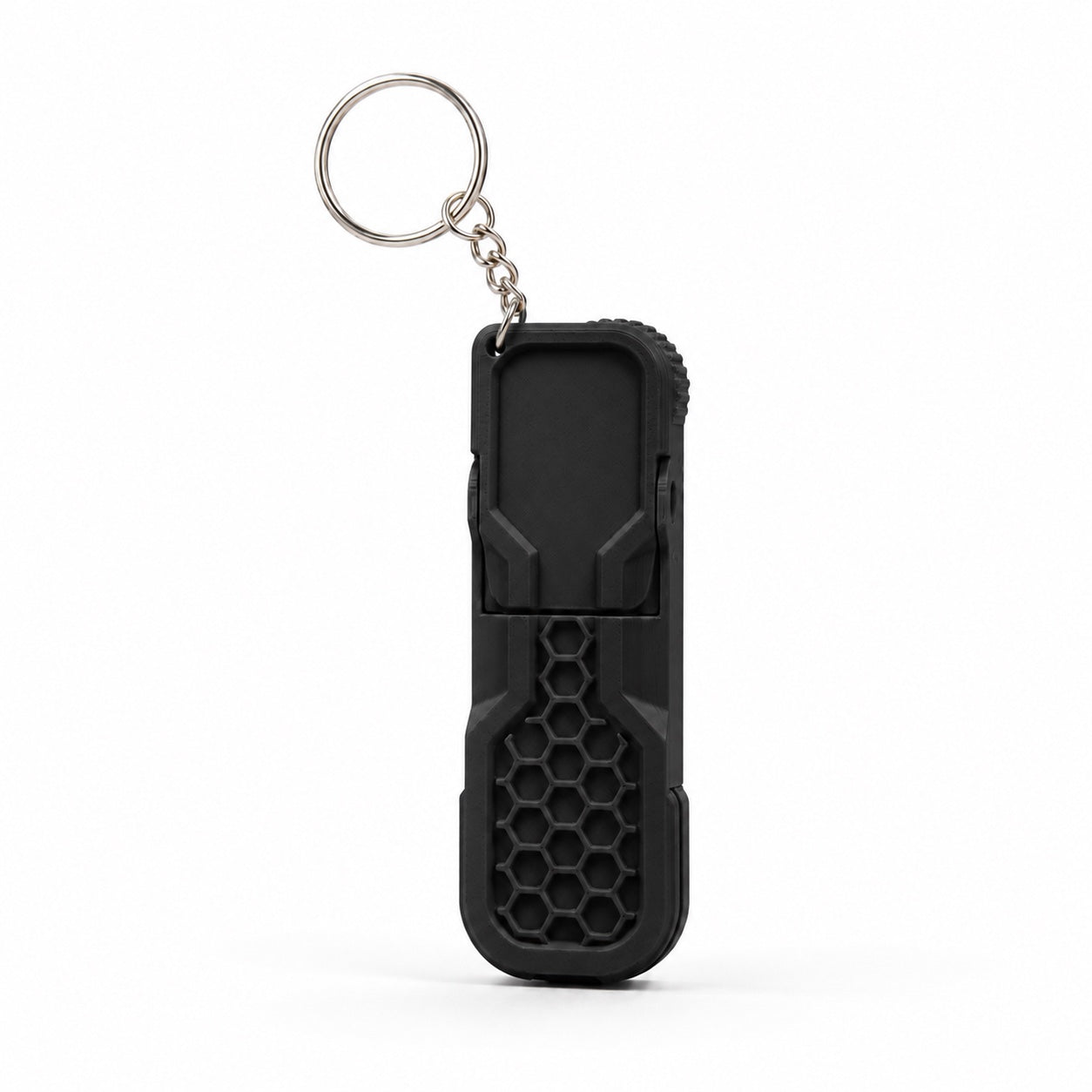 Black fidget phone stand keychain with honeycomb texture and metal keyring