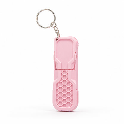 Pink fidget phone stand keychain with honeycomb texture by DMV Print Lab