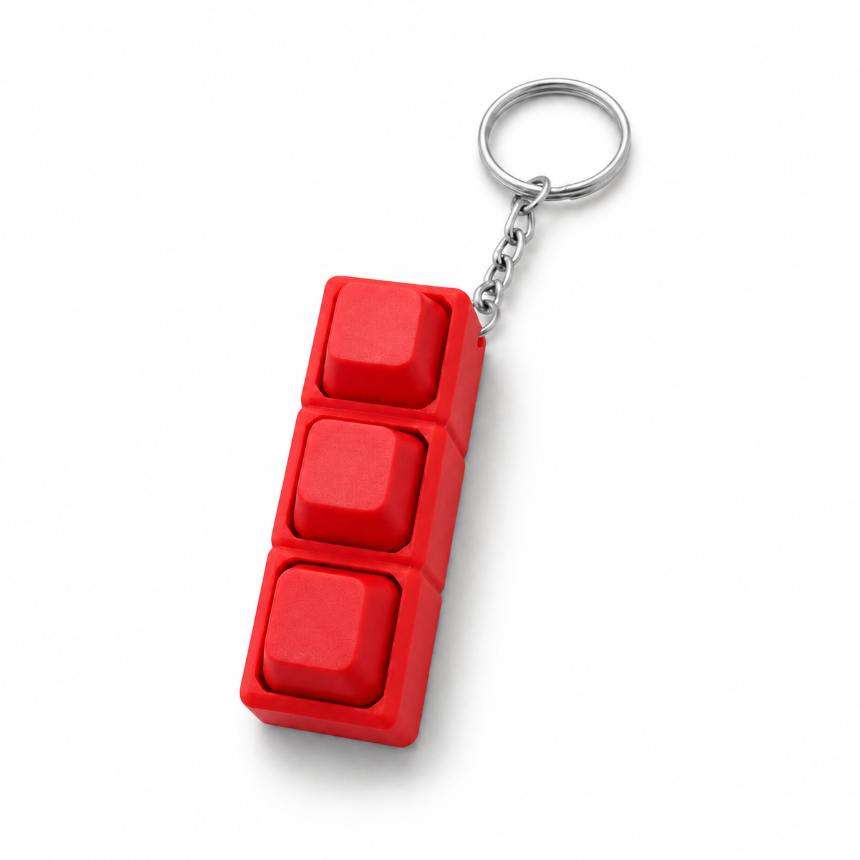 Red custom 3D printed keyboard keycap keychain on white background by DMV Print Lab